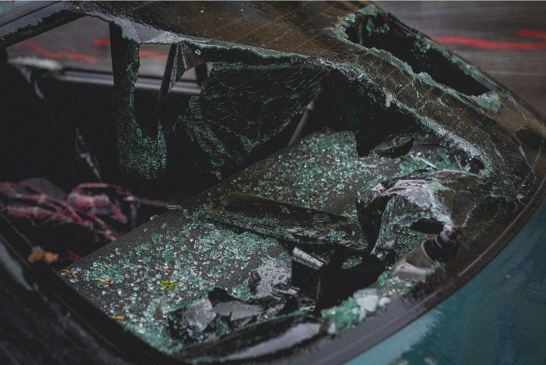 shattered car window after a car accident